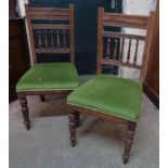 A pair of Edwardian spindle back dining chairs and a panel back similar, all with green velour
