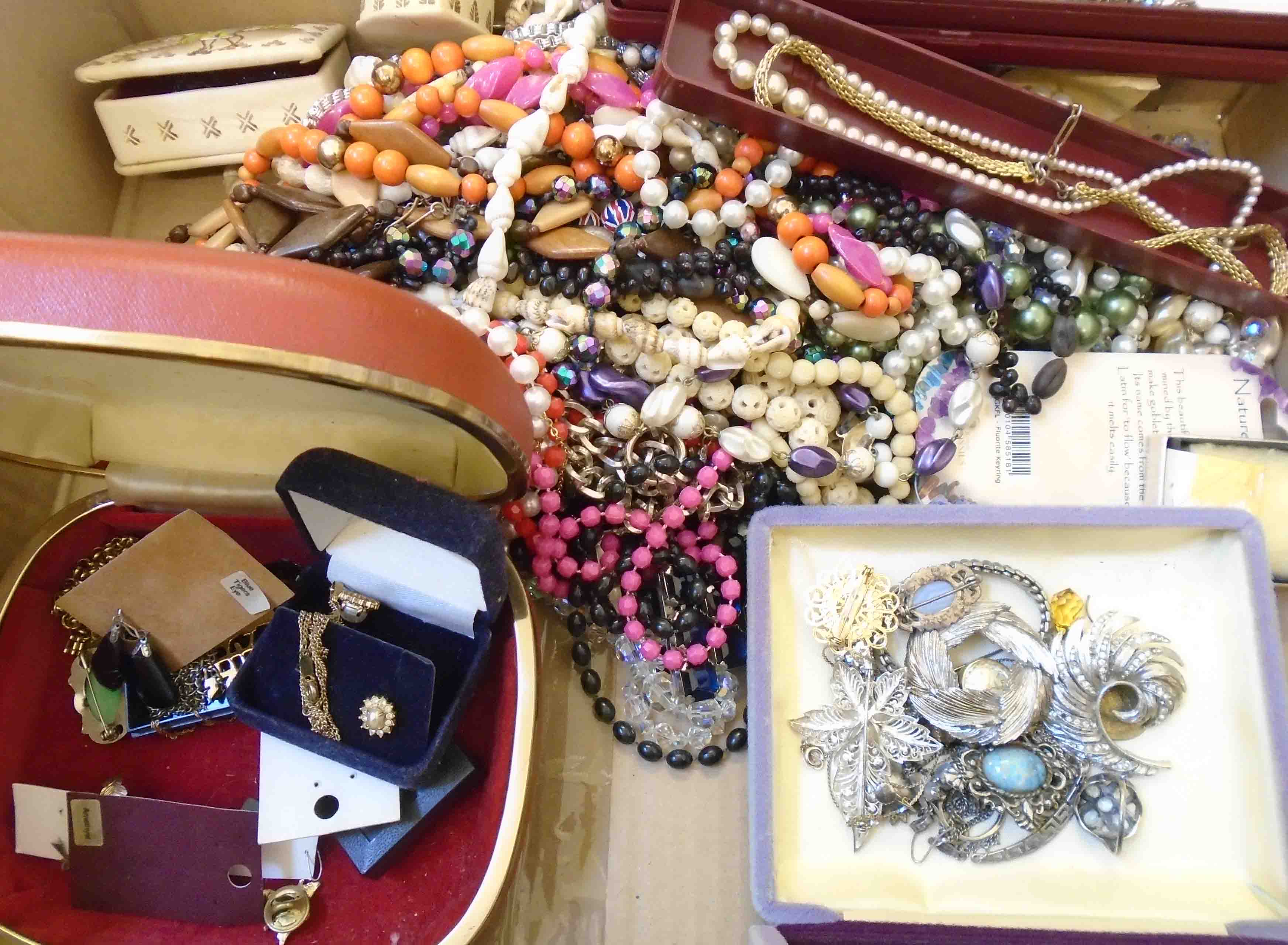 A box containing a quantity of assorted costume jewellery