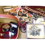 A box containing a quantity of assorted costume jewellery