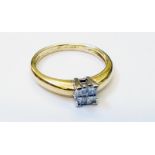 An 18ct. gold ring, set with four small princess cut diamonds to centre