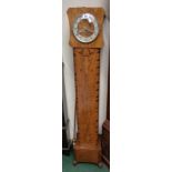 An Art Deco inlaid walnut cased granddaughter clock with eight day Westminster/Whittington chiming