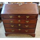 A 3' 3" late Georgian mahogany two part bureau with fully fitted interior and single drawer over