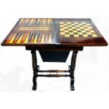 A 30" Victorian rosewood fold-over games/work table with inlaid top, drawer and material slide