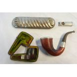 A cased cubed form pipe with silver collar and amber mouthpiece - sold with a further pipe with