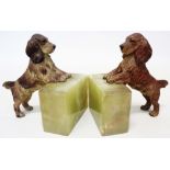 A pair of early 20th Century green onyx book ends mounted by cold painted bronze spaniels - black