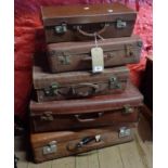 Five vintage suitcases