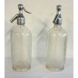 Two vintage Schweppes etched glass soda syphons