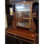 A 29" William IV flame mahogany veneered platform dressing table mirror with moulded lyre pattern