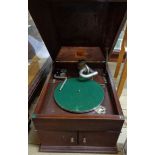 An early 20th Century oak cased H.M.V. gramophone with speaker cabinet