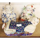 A late 20th Century Chinese figure pattern pillow - sold with two Hotei figures