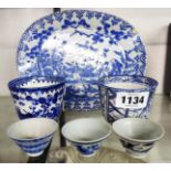 A blue and white Chinese oval dish depicting boys playing in a garden (a/f) - sold with two tea