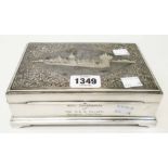 An 8" Thai Nakon marked 'Siam Sterling' white metal cigarette box with decorative royal rowing