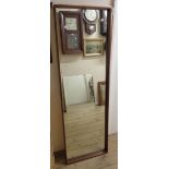 A vintage teak framed full length wall mounted dressing mirror