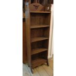 A 15" early 20th Century polished oak five shelf open bookcase with pierced top