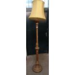 An old Italian giltwood torchére style standard lamp with ornate acanthus capital, twist and