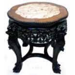 A 17" 1920's Chinese polished hardwood and marble inset petal topped occasional table with