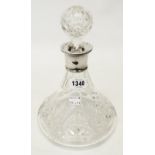 A cut glass ship's decanter with personalised silver collar