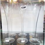 A set of six Champagne flutes with etched decoration