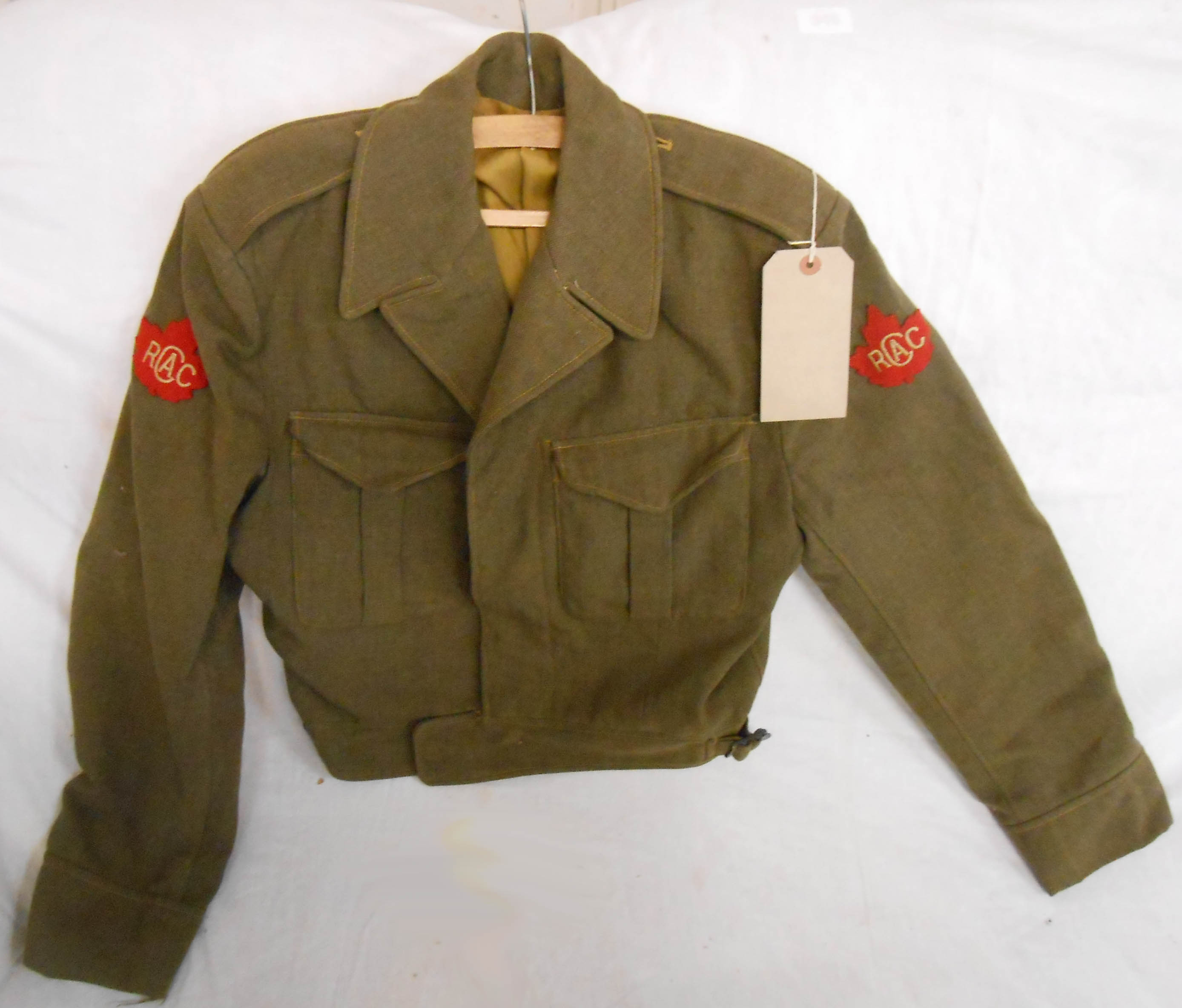 A Second World War period P37 Canadian battledress blouse bearing Royal Canadian Army Cadet patches