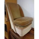 A 1930's boudoir chair with old gold velour upholstery