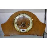A mid 20th Century polished walnut cased Bentima mantel clock with floating escapement and eight day