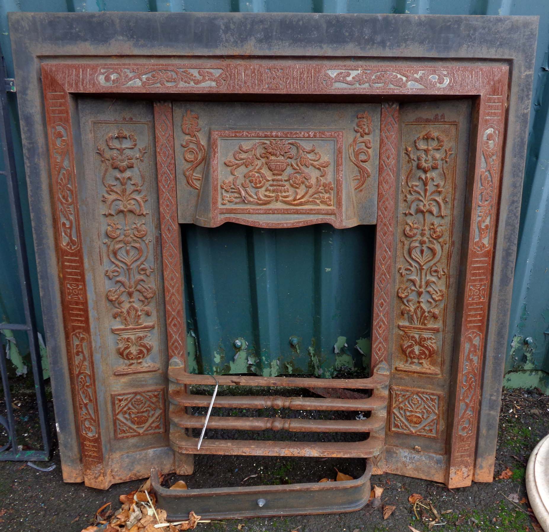 A heavy cast iron fireplace insert