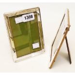 A pair of matching silver fronted oak easel backed photograph frames, by Huxley and Sidebotham -