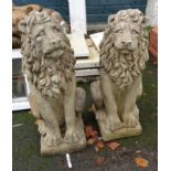 A pair of precast concrete lion ornaments - height 30"