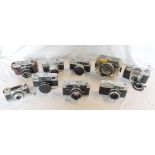 A collection of Ricoh 35mm and other cameras including Marine AD casing, Supershot, etc. - various