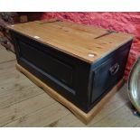 A 35 1/2" part painted and waxed pine locker chest with iron strapwork hinges and flanking