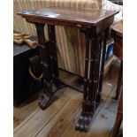 A nest of three 19th Century rosewood tea tables (from a quartetto set), set on twin flanking