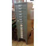 An 11" vintage Bisley grey painted metal fifteen drawer filing cabinet