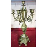 An ornate cast brass six branch candelabrum - height 23 3/4"