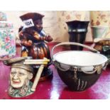 A treacle glaze Toby jug and another - sold with a stoneware bowl with silver plated mount