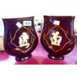 A pair of treacle glaze vases with figural decoration