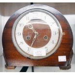 An mid 20th Century polished walnut cased mantel clock with Smiths Enfield eight day gong striking