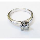 A marked 18ct. white metal diamond solitaire ring - 1.3ct.