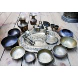 A collection of brassware including bowls, jugs, etc. - sold with five pairs of brass candlesticks