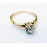 An unmarked yellow metal diamond solitaire ring - approx. 0.5ct.