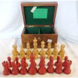 A mahogany Staunton Chessmen box containing an associated white and red lacquered Staunton pattern
