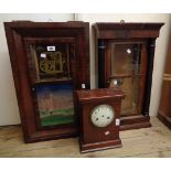 Two American wall clocks with part movements - sold with a mahogany table clock case - various