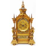 A 19th Century French gilt metal and champlevé enamel ornate salon mantel clock with pierced finial,