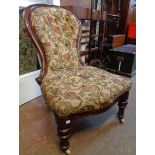 A Victorian mahogany part show frame spoon back chair with decorative button back tapestry