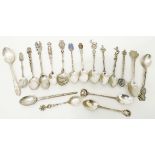 A quantity of silver and white metal teaspoons, mainly collector's spoons, some with ornate cast,