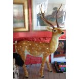 A plush covered sectional deer ornament - length 3' 6"