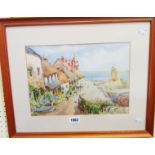 Harry. E. Crute: a framed watercolour, depicting a scene at Lynmouth with figures, buildings and sea