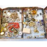 A decorative folding box containing a quantity of good quality costume jewellery