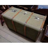 A 34" vintage bentwood bound travelling trunk with tray fitted interior, brass latches and green