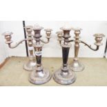 A pair of 10 1/2" silver plated candlesticks - sold with a pair of three branch candelabra