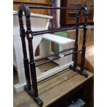 A late Victorian stained wood double towel rail